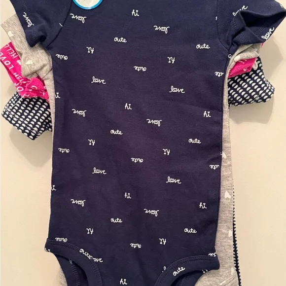 NWT set of 4 CARTER’S ONSIES. Baby Size 9 months Brand New still on hangers NEW - Picture 6 of 12